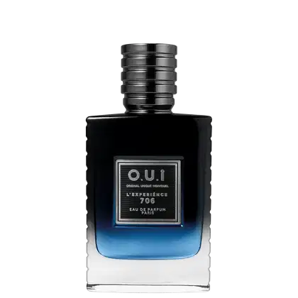 Frasco de item de perfumaria preto e azul com rótulo "L'EXPÉRIENCE 706" e texto "EAU DE PARFUM PARIS" em fundo escuro.