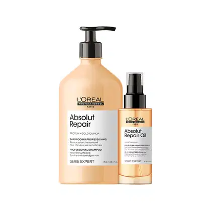 Dois produtos de cabelo da marca L'Oréal Professionnel: um frasco de shampoo Absolut Repair e um frasco de óleo Absolut Repair Oil, ambos em embalagens de plástico com cores claras e rótulos pretos.