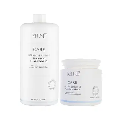 Dois produtos de cuidados com os cabelos da marca Keune Care: um frasco de shampoo Derma Sensitive e um pote de máscara Derma Sensitive, ambos em embalagens brancas com detalhes em azul claro.