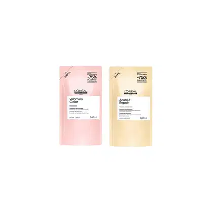 Dois frascos de produtos L'Oréal Professionnel: um rosa com o rótulo "Vitamino Color" e outro amarelo com o rótulo "Absolut Repair". Ambos os frascos possuem 240ml e indicam um desconto de 75% na embalagem plástica.