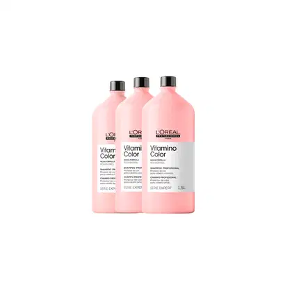 Três frascos de shampoo profissional L'Oréal Professionnel Vitamino Color, com rótulos em rosa e branco, apresentando a marca e a linha de produtos.