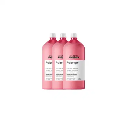 Três frascos de shampoo profissional L'Oréal Professionnel Pro Longer, com embalagem rosa e rótulos brancos, apresentando informações sobre o produto e a marca.