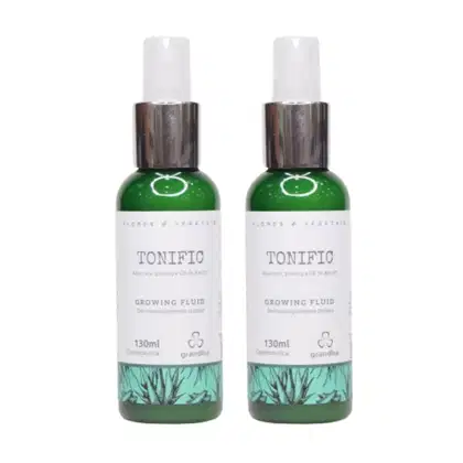 Dois frascos de 130ml do produto de beleza Tonific da marca Grandha, com embalagem em cores verde e branca, contendo informações sobre o produto "Growing Fluid" em rótulo.