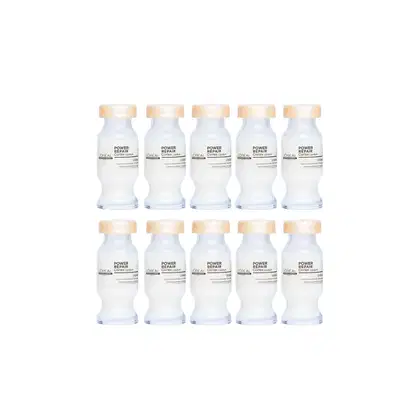 Dez frascos brancos de 10 ml da linha Power Repair da L'Oréal Professionnel, com tampas bege e rótulos indicando o nome do produto.