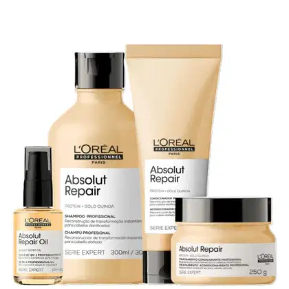 Produtos da linha Absolut Repair da L'Oréal Professionnel, incluindo shampoo, condicionador, máscara e óleo capilar, em embalagens com design minimalista em tons de bege e preto.