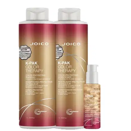 Dois frascos de shampoo e condicionador Joico K-Pak Color Therapy, com embalagens em tons de vermelho e dourado, e um frasco menor de óleo Joico K-Pak Color Therapy Luster Lock.