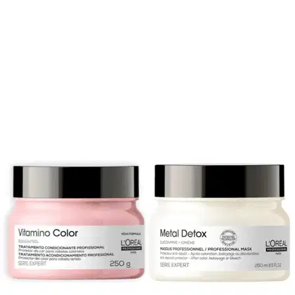 Duas máscaras da L'Oréal Professionnel:  "Vitamino Color" e  "Metal Detox", ambas com tampas pretas e contendo 250g/ml do produto.