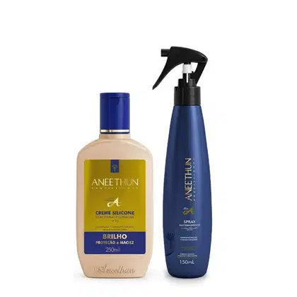 Dois produtos de cuidados capilares da marca Aneethun. Um é um creme de silicone em um frasco plástico bege de 250ml, com rótulo amarelo e azul. O outro é um spray de modelagem em uma embalagem plástica azul de 150ml, com um acionador preto.