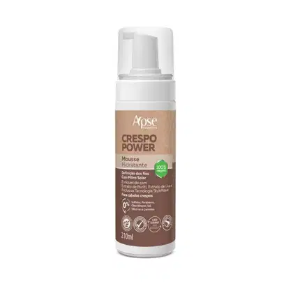 mousse hidratante da linha Crespo Power da marca Apice Cosmetics. A embalagem é um frasco branco com uma tampa branca e um rótulo bege com o nome do produto "Crespo Power" e informações sobre sua composição e benefícios.