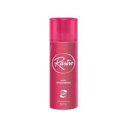 Frasco de desodorante spray Rastro, com embalagem rosa vibrante e rótulo com o nome da marca em branco. O produto é descrito como tendo ação antibacteriana e proteção por 24 horas.
