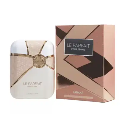 O produto apresentado é um perfume feminino da marca Armaf. Consiste em um frasco de perfume branco com detalhes dourados e uma caixa de embalagem em tons de rosa, marrom e preto.