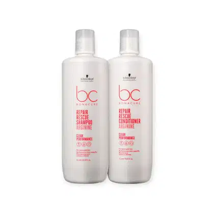 Dois frascos brancos da linha Bonacure da Schwarzkopf Professional, contendo o Shampoo Repair Rescue Arginine e o Condicionador Repair Rescue Arginine, ambos com rótulos vermelhos destacando o nome da linha e a função de reparação.