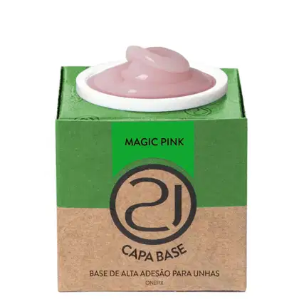 A imagem mostra uma base de alta adesão para unhas. O produto vem em uma embalagem retangular de papelão verde e marrom. No centro, há um recipiente branco contendo o produto, que parece ser um gel em tom rosa.
