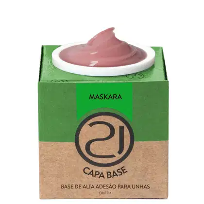 A imagem mostra uma base de alta adesão para unhas. O produto vem em uma embalagem retangular de papelão verde e marrom. No centro, há um recipiente branco contendo o produto, que parece ser um gel em tom rosa.