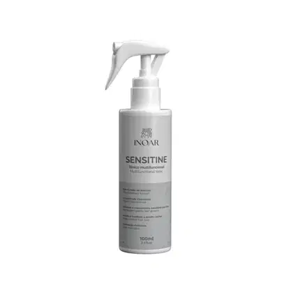 Frasco brancoda marca Inoar, contendo um tônico multifuncional para cabelos chamado Sensitine, com texto legível na embalagem.