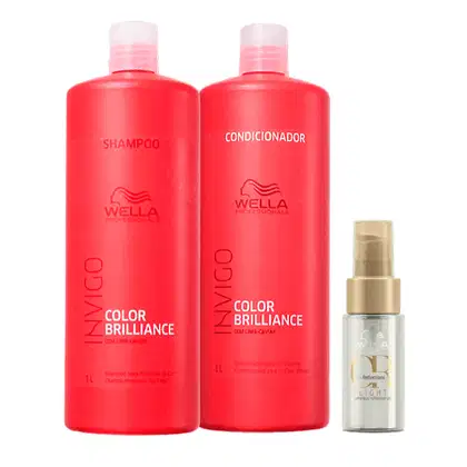 Conjunto de produtos Wella Professionals para cuidados com cabelos coloridos, incluindo shampoo, condicionador e um óleo capilar. As embalagens são vermelhas com o nome da linha "Invigo Color Brilliance" e o logotipo da marca Wella.