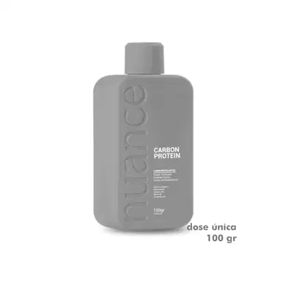Frasco de 100 gramas da escova progressiva Nuance Professional. O frasco é predominantemente cinza, com o nome da marca e o tipo de produto claramente exibidos no rótulo. A embalagem possui um design simples e minimalista, com uma tampa na parte superior.