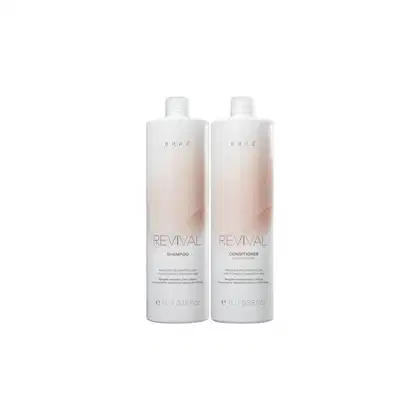 Dois frascos de produtos de cabelo da marca Braé, um shampoo e um condicionador da linha Revival, com embalagens brancas e rótulos em letras pretas.