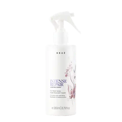 Frasco branco de spray para reparação intensa de cabelos, da marca Braé, com rótulo em tons de roxo e rosa, contendo 260ml do produto.