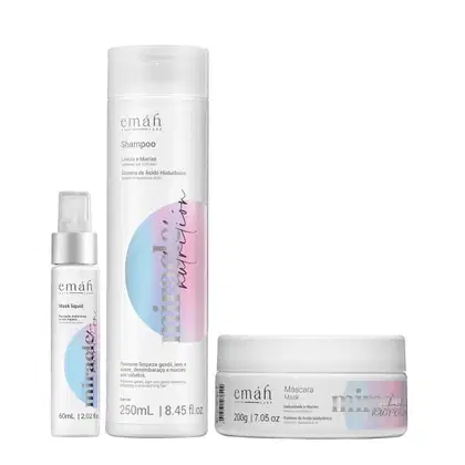 Emáh Hair Care: Shampoo de 250mL, Máscara de 200g e Máscara Líquida de 60mL, com embalagens brancas e detalhes em tons pastel, apresentando o sistema de Ácido Hialurônico como destaque.