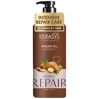 Frasco de shampoo Kerasys Argan Oil com 400 ml, embalagem em tons de marrom e amarelo, com rótulo destacando "Intensive Repair Care" e "Damage Repair" para cabelos danificados.