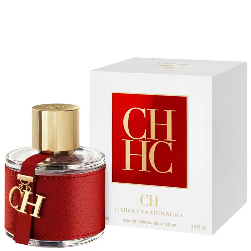 Frasco de perfume Carolina Herrera em embalagem vermelha com detalhes dourados, tampa dourada e logotipo da marca visível.
