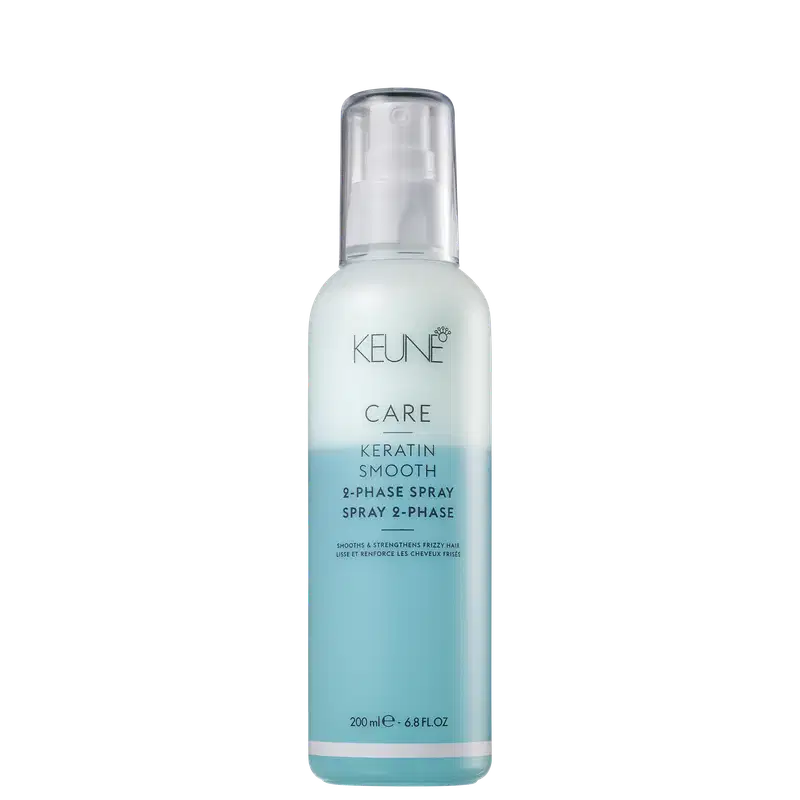 Frasco de spray Keune Care Keratin Smooth, com 200 ml de conteúdo. O produto apresenta uma embalagem de plástico transparente com rótulo azul claro e texto em preto indicando "2-Phase Spray".