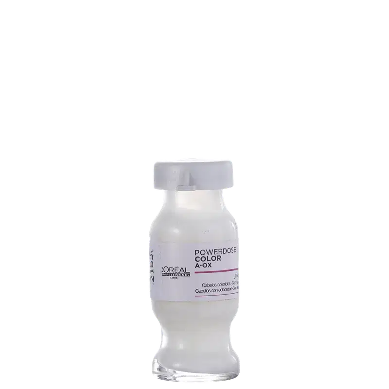 Frasco de vidro branco com tampa branca. Rótulo com texto "POWERDOSE COLOR A-OX L'OREAL PROFESSIONNEL" em letras pretas. Produto de perfumaria com informações sobre cor e tratamento para cabelos.