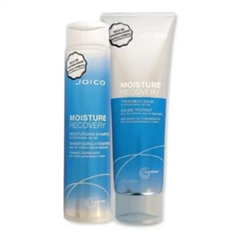 Dois frascos de marca Joico, um azul e outro branco, com rótulos indicando "Moisture Recovery" e "Moisture Deposit".