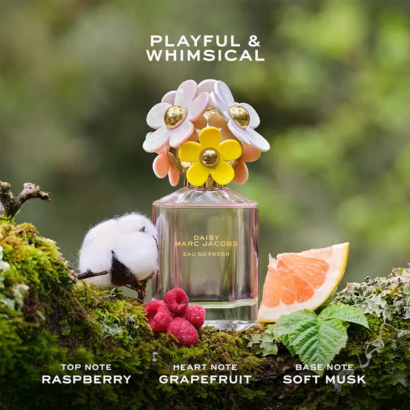 Frasco de perfume Daisy Marc Jacobs Eau So Fresh, com tampa decorada com flores coloridas em tons de rosa, amarelo e branco, em fundo branco.