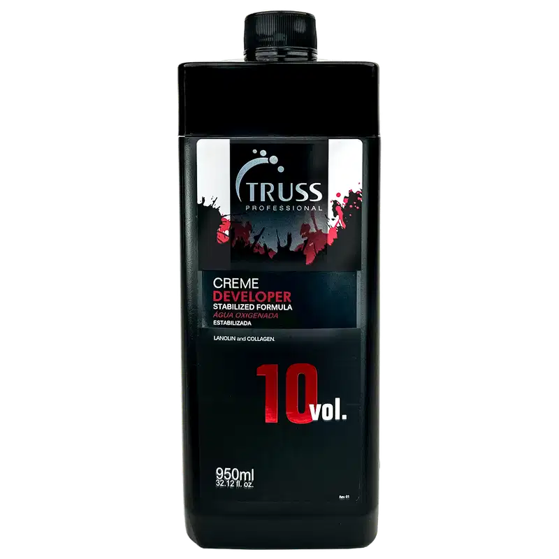 Frasco preto da marca Truss Professional contendo Creme Developer, fórmula estabilizada com 10 volumes, embalagem de 950ml, com rótulo em preto e vermelho destacando a informação de "Creme Developer".
