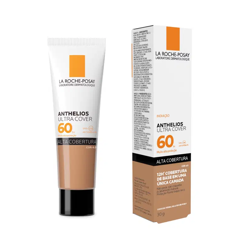 Produto de proteção solar da marca La Roche-Posay, com embalagem em tubo branco e laranja. Rotulado como "Anthelios Ultra Cover 60", indicando um fator de proteção solar 60. Destaca-se a informação "Alta cobertura" na embalagem.