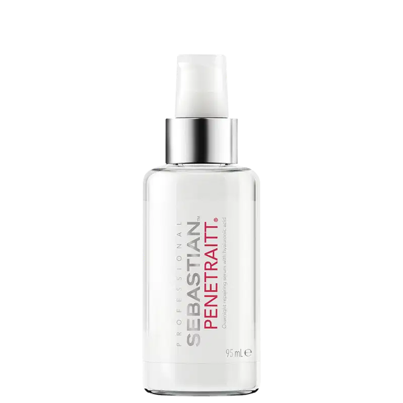 É um produto de tratamento capilar da marca Sebastian Professional. A embalagem é um frasco transparente. O frasco tem uma forma cilíndrica e contém um líquido incolor. Na parte frontal do frasco, há um o texto "Sebastian Penetraitt"