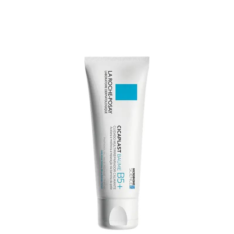 Tubo branco de 100 ml do produto de cuidados com a pele Cicaplast Baume B5+ da marca La Roche-Posay, com rótulo azul destacando seus benefícios de cuidado e restauração da barreira cutânea.