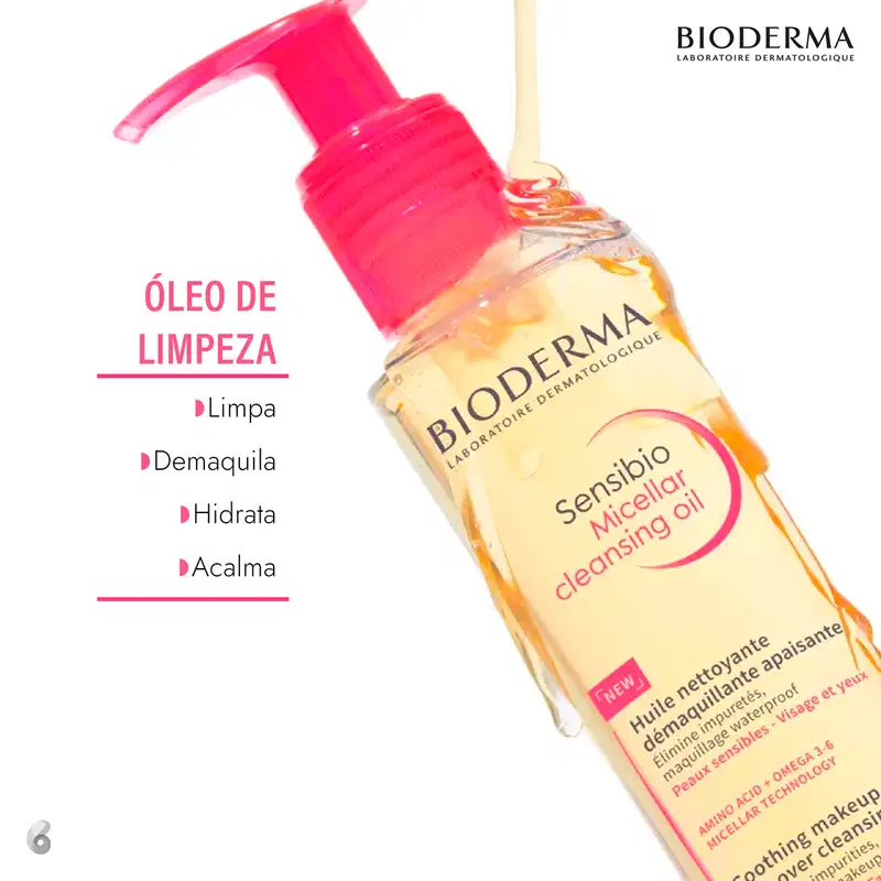 Frasco de óleo de limpeza da marca Bioderma com bomba doseadora, contendo texto "Sensibio Micellar Cleansing Oil" e informações sobre os benefícios do produto, como limpar, desmaquiar, hidratar e acalmar a pele.