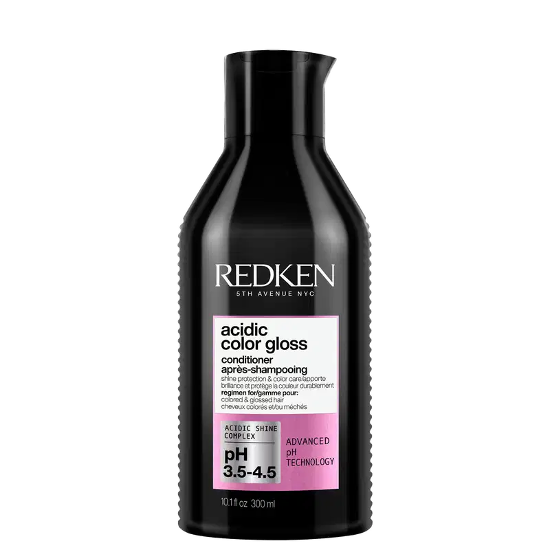 Frasco preto da linha Redken 5th Avenue NYC contendo condicionador Acidic Color Gloss, com rótulo rosa destacando o pH 3.5-4.5 e a tecnologia avançada de pH.