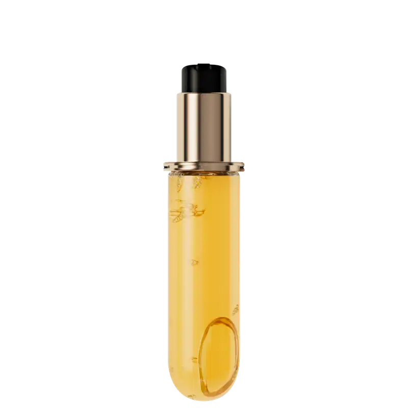 A imagem mostra a embalagem refil do óleo elixir ultime. É um frasco de vidro cilíndrico com um líquido de aparência oleosa e cor amarelo-dourado. O frasco possui uma tampa em pump dourada com detalhes em preto.