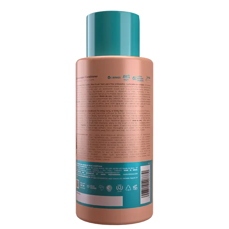 A imagem mostra a parte de trás da embalagem do Condicionador Inoar Meu Cacho, Meu Crush Teen 500ml. Há texto em português e inglês com informações sobre o produto e instruções de uso.
