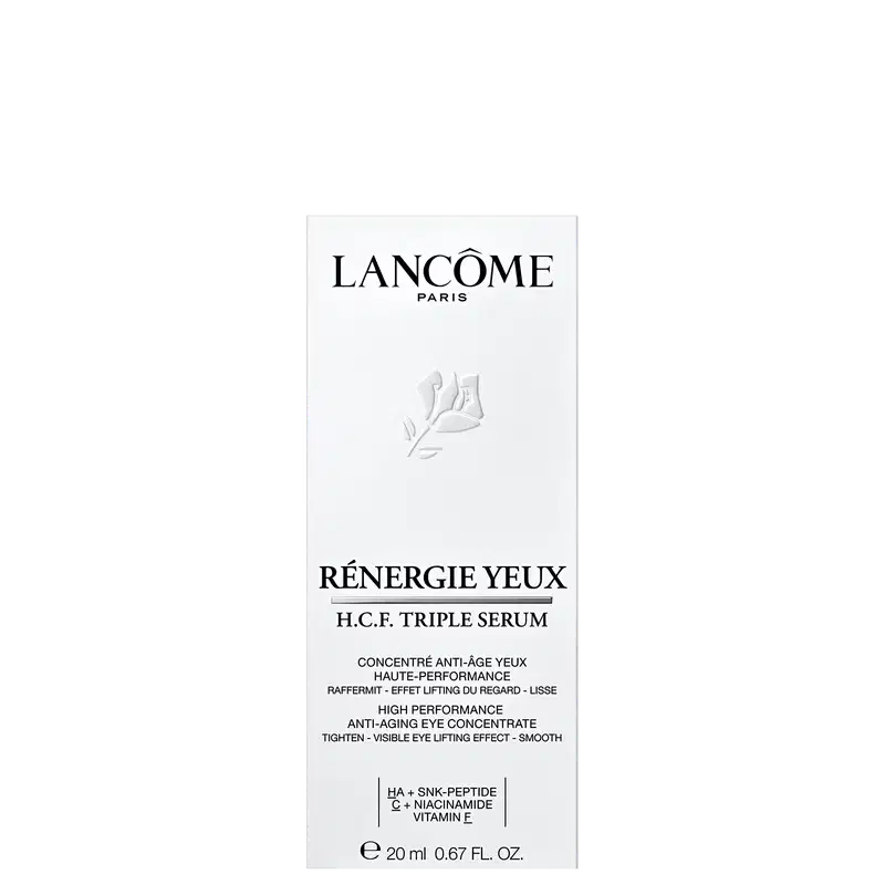 Embalagem retangular branca de sérum de tratamento para área os olhos com o logotipo e nome da marca em letras pretas. Imagem estilizada de uma folha ou ramo na parte inferior. Rótulo "Rénergie Yeux H.C.F. Triple Serum" em letras maiúsculas pretas.