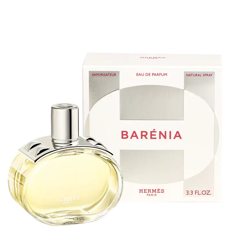 A imagem mostra o frasco do perfume e sua caixa ao lado que é branca com detalhes em prata e vermelho. Na parte frontal apresenta o H, logo de Hermès e informações sobre o perfume.