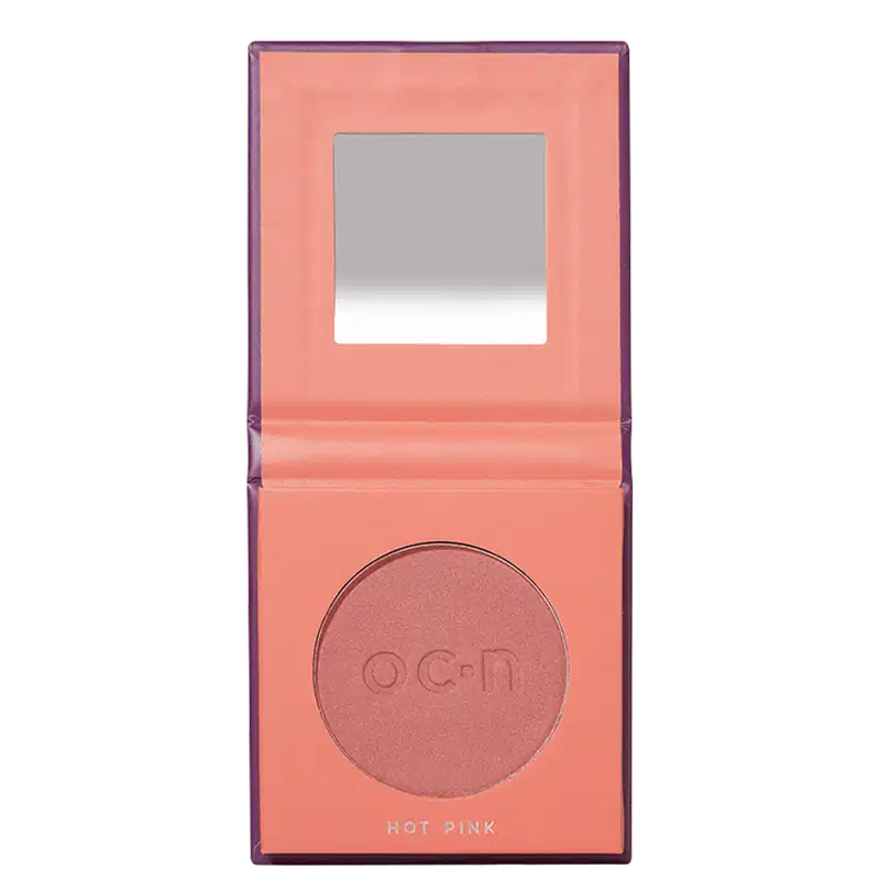 A embalagem está aberta mostrando um espelho na parte superior e o blush compacto em tom de rosa.