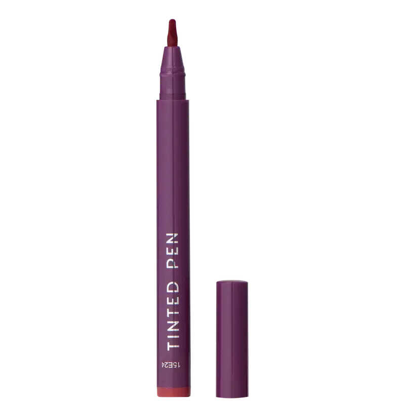 A imagem mostra a caneta batom Tinted Pen da Océane, em embalagem plástica roxa em formato de caneta. O nome "Tinted Pen" está impresso em letras brancas na lateral da embalagem.