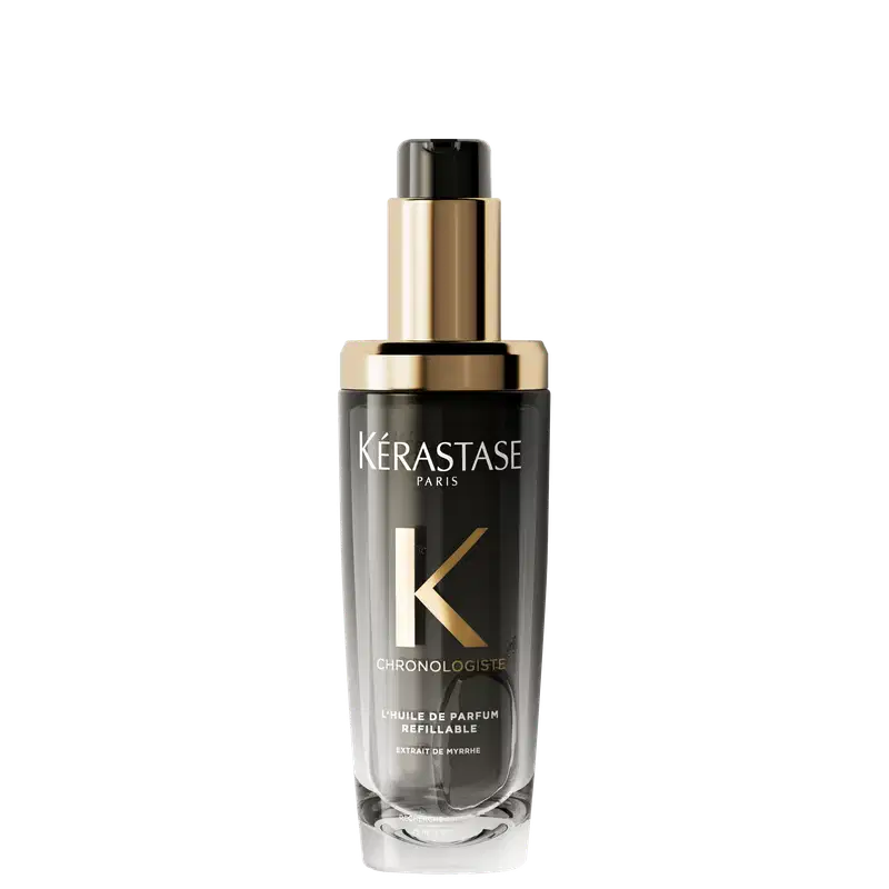 Frasco de óleo de perfume refinável da linha Chronologiste da Kérastase, com design elegante em tons de dourado e preto, destacando o logotipo da marca.