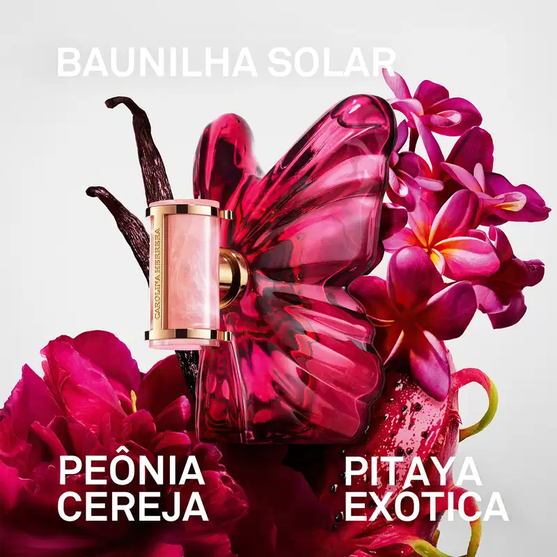 Frasco de perfume Carolina Herrera em formato de borboleta, com tampa dourada e corpo em tom de rosa intenso, destacando a elegância e sofisticação da marca.