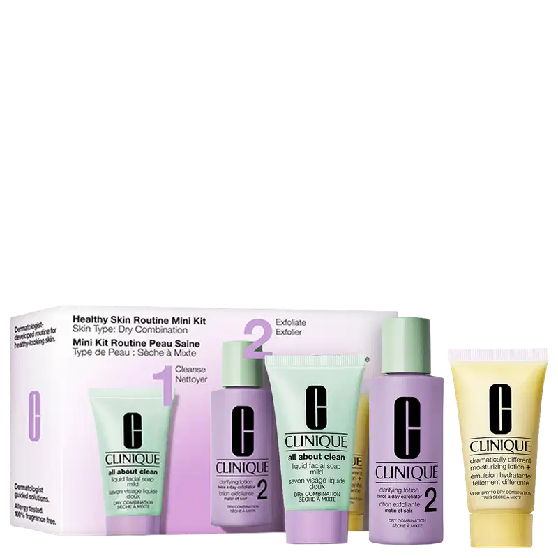 Caixa de kit de rotina de pele saudável para pele seca e mista. Contém limpador, esfoliante, loção clarificante e hidratante. Embalagem com frascos e tubos nas cores verde, lilás e amarelo com logotipo da marca Clinique.