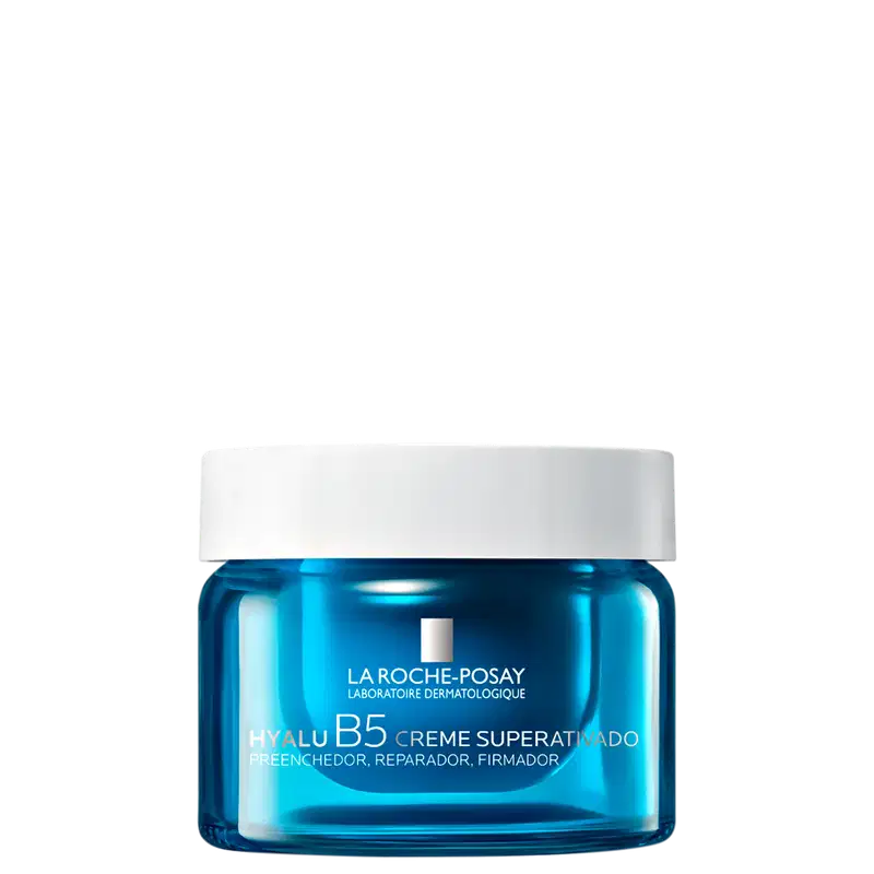 Frasco de creme facial da linha Hyalu B5 da La Roche-Posay, com embalagem de vidro azul brilhante e tampa branca. O rótulo destaca os benefícios de preenchimento, reparação e firmeza da pele.