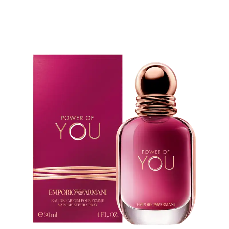 Caixa e perfume Power of You Armani Eau de Parfum exibe o texto "POWER OF YOU" em letras douradas sobre fundo rosa vibrante. O design é elegante e minimalista, com uma aparência sofisticada.