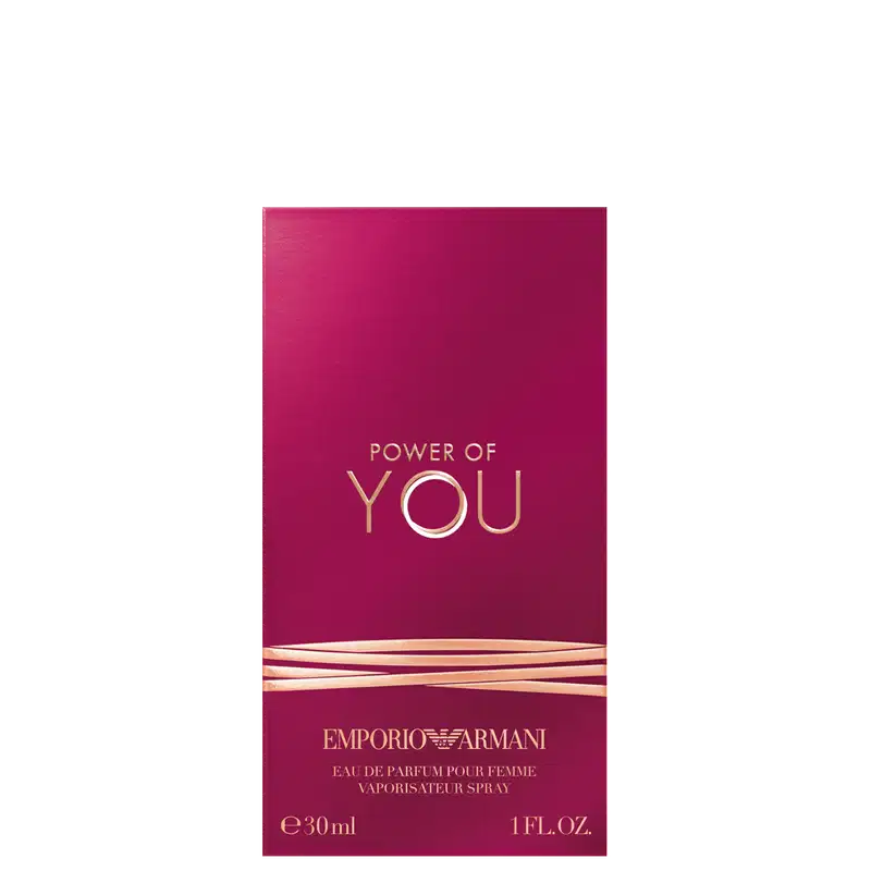 Caixa Power of You Armani Eau de Parfum exibe o texto "POWER OF YOU" em letras douradas sobre fundo rosa vibrante. O design é elegante e minimalista, com uma aparência sofisticada.