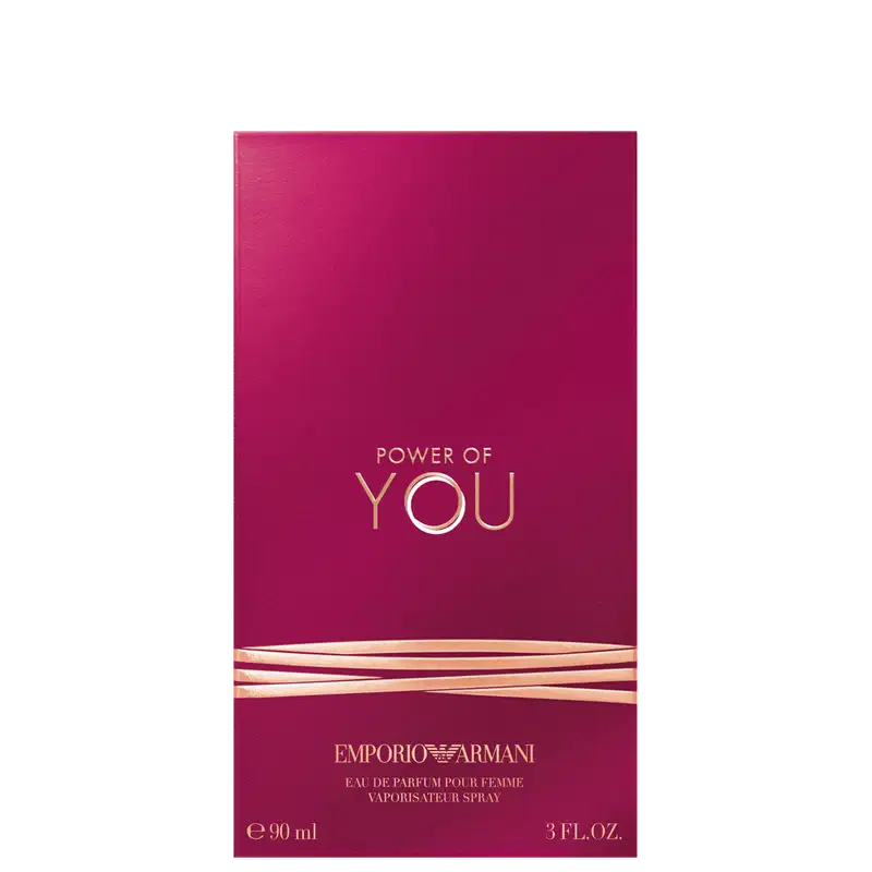Caixa Power of You Armani Eau de Parfum exibe o texto "POWER OF YOU" em letras douradas sobre fundo rosa vibrante. O design é elegante e minimalista, com uma aparência sofisticada.