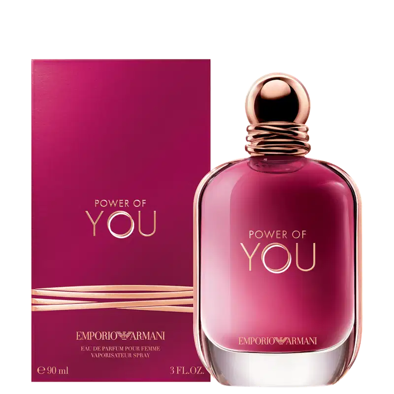 Caixa e perfume Power of You Armani Eau de Parfum exibe o texto "POWER OF YOU" em letras douradas sobre fundo rosa vibrante. O design é elegante e minimalista, com uma aparência sofisticada.
